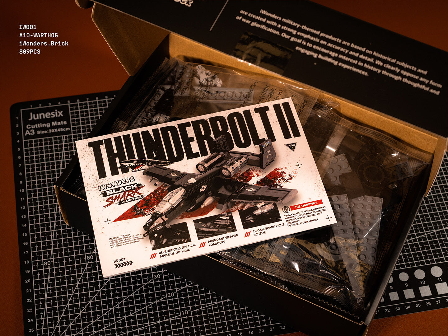 Thunderbolt II A-10 Warthog military building block set with 809 pieces, featuring classic shark paint scheme and weapon loadouts.